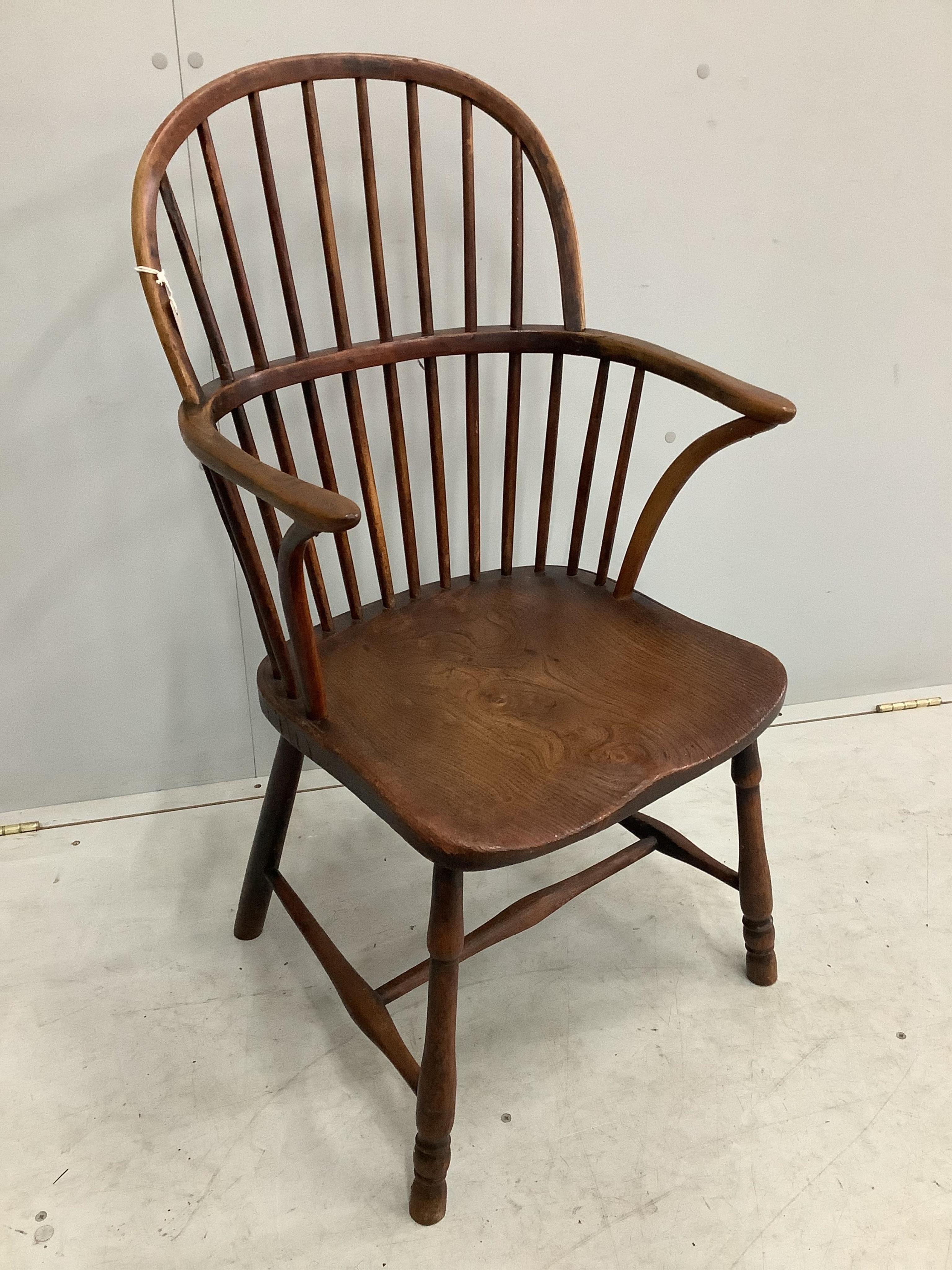 A 19th century Thames Valley elm and beech comb back Windsor elbow chair, width 49cm, depth 41cm, height 93cm. Condition - fair